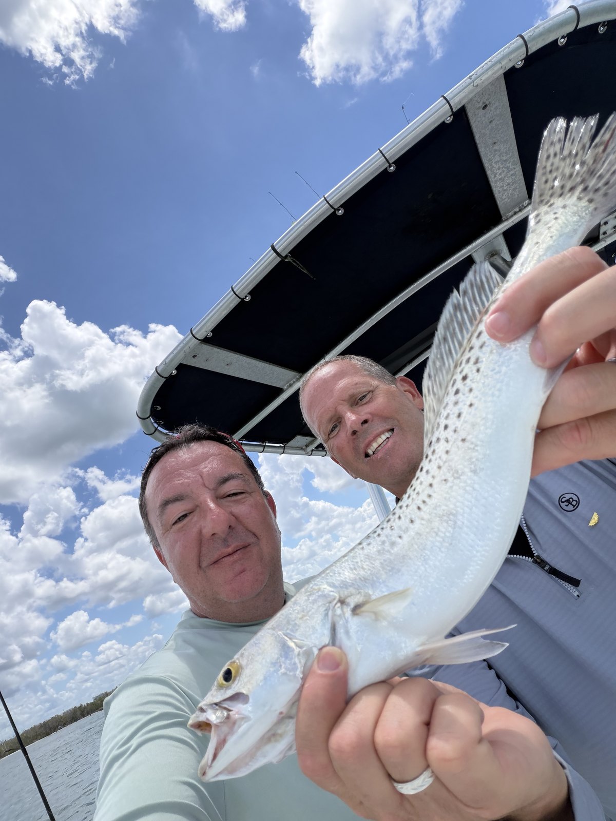 Charlie Hough fishing offshore with a friend — real life after the C-suite.